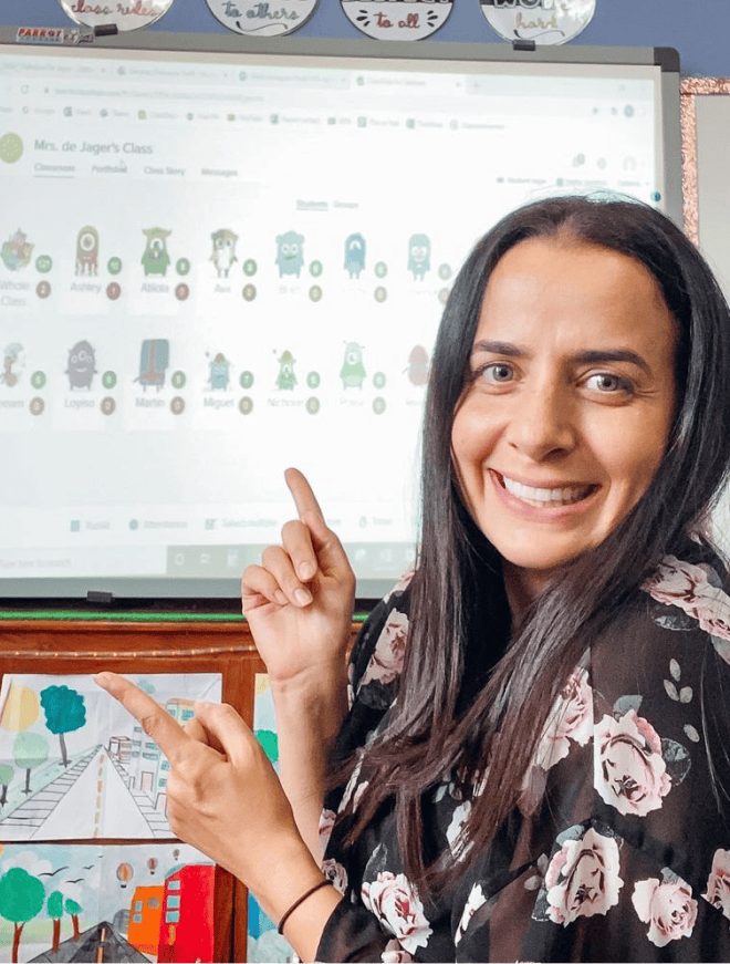 teacher showing classdojo class projected on a whiteboard