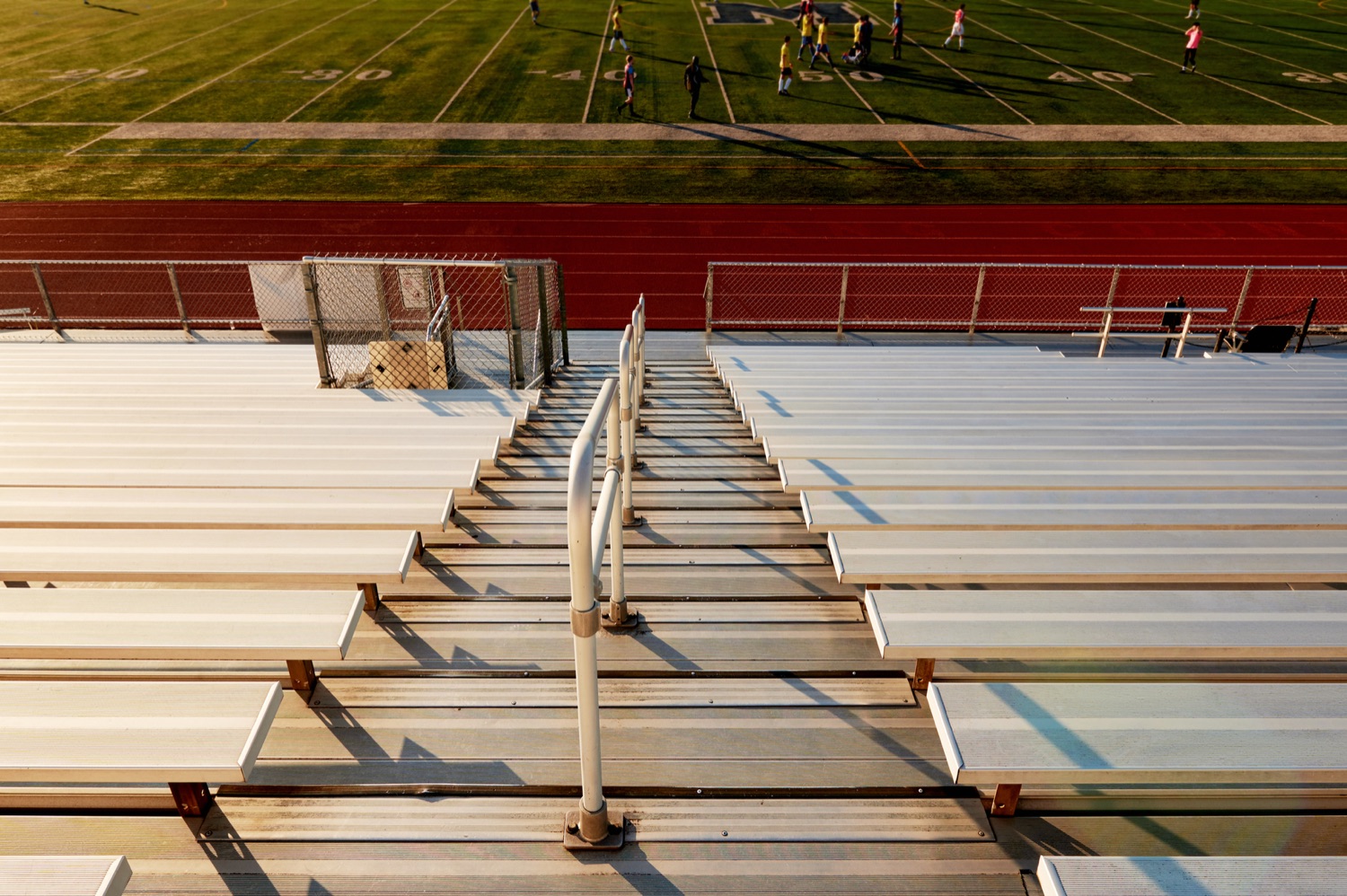 Stadium bleachers overlooking the practice field