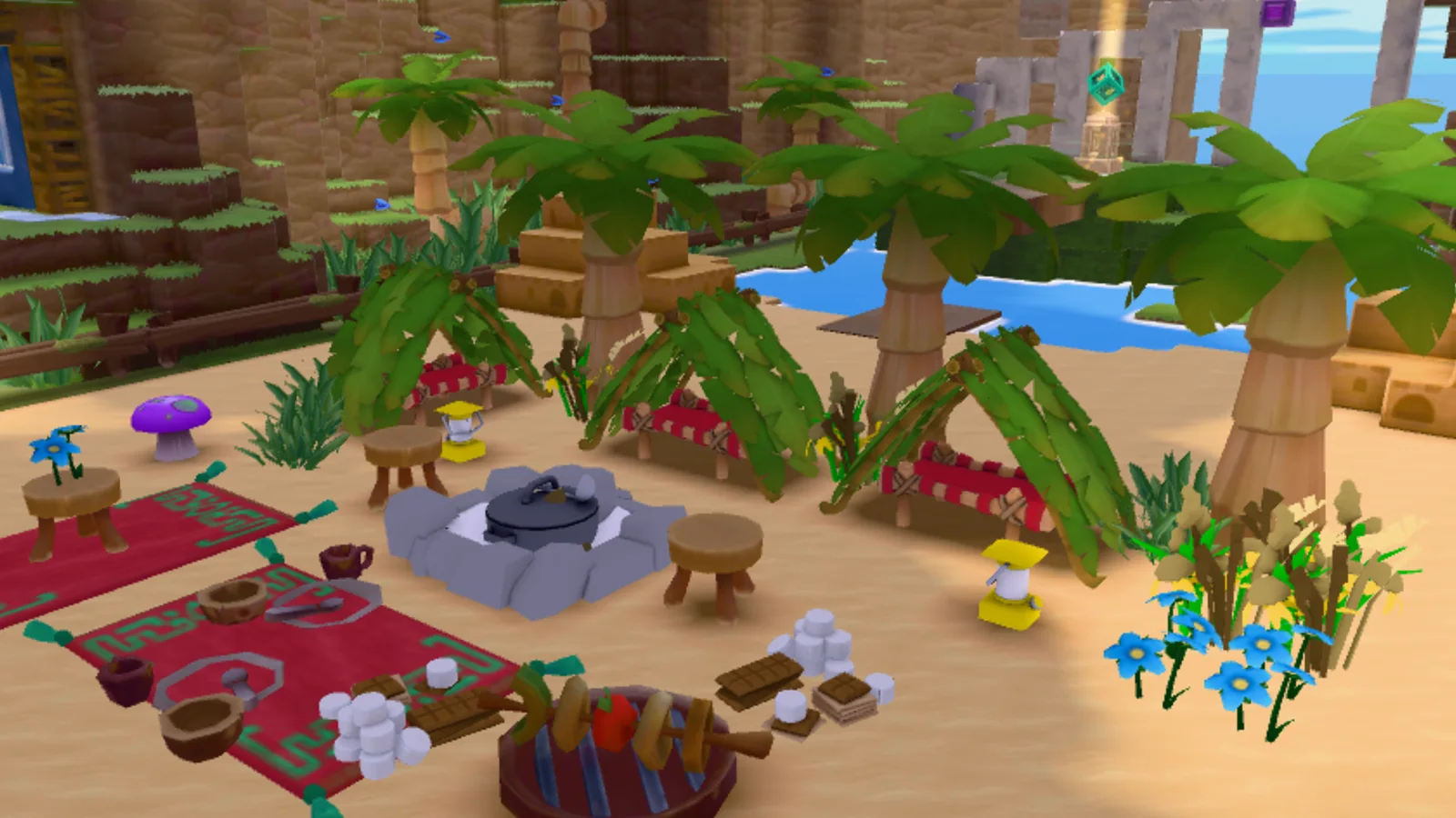 A Dojo Islands camp built from crafted props: a firepit, stools, rugs, lanterns, palm trees and flowers.