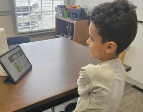 Student using tablet for online learning