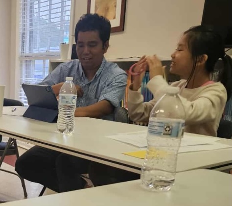 Child engaged in tutoring session