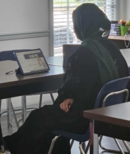 Students learning together with tablets